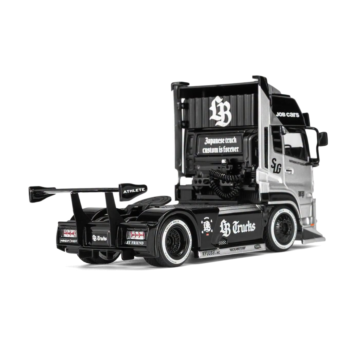 Motorhelix 1:64 LB-Trucks UD Quon Head Black & Silver M61206
