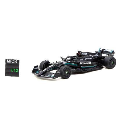 Tarmac Works 1:64 Mercedes-AMG F1 W14 E Performance Spanish Grand Prix 2023 Mick Schumacher with pit board